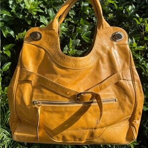 Anna Corinna (of Foley + Corinna) mustard leather tote bag with gold hardware